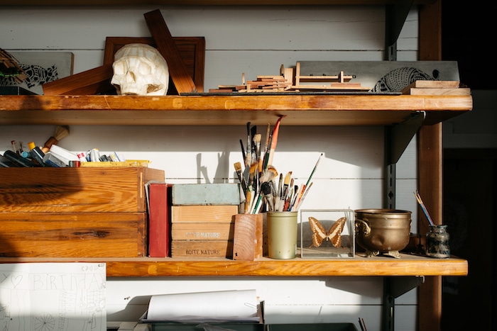 an image of a workshelf that looks so disorganized, depicting a landing page that needs optimization