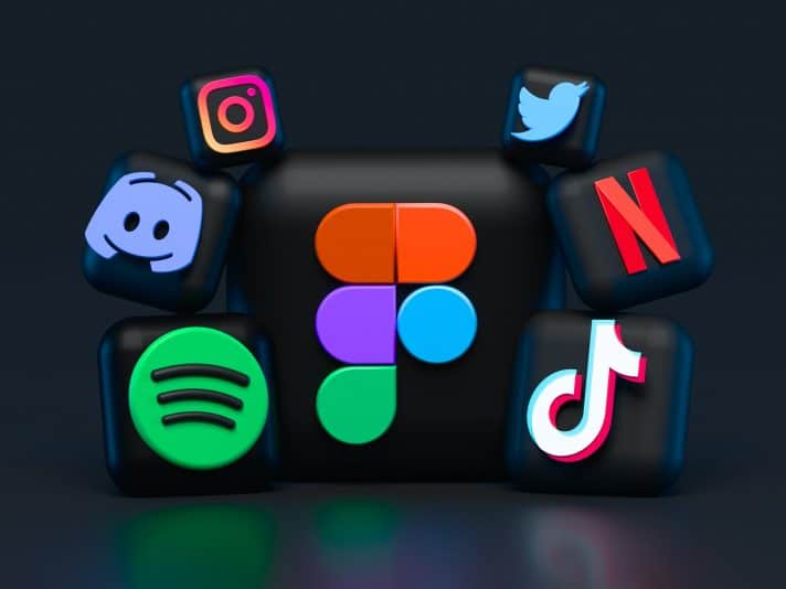 An image carrying Twitter logo, Facebook’s, Spotify, discord and other social channels for social commerce - selling in app