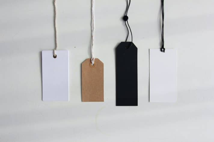 An image with different tags in different colors and sizes depicting how to leverage the price anchor effect