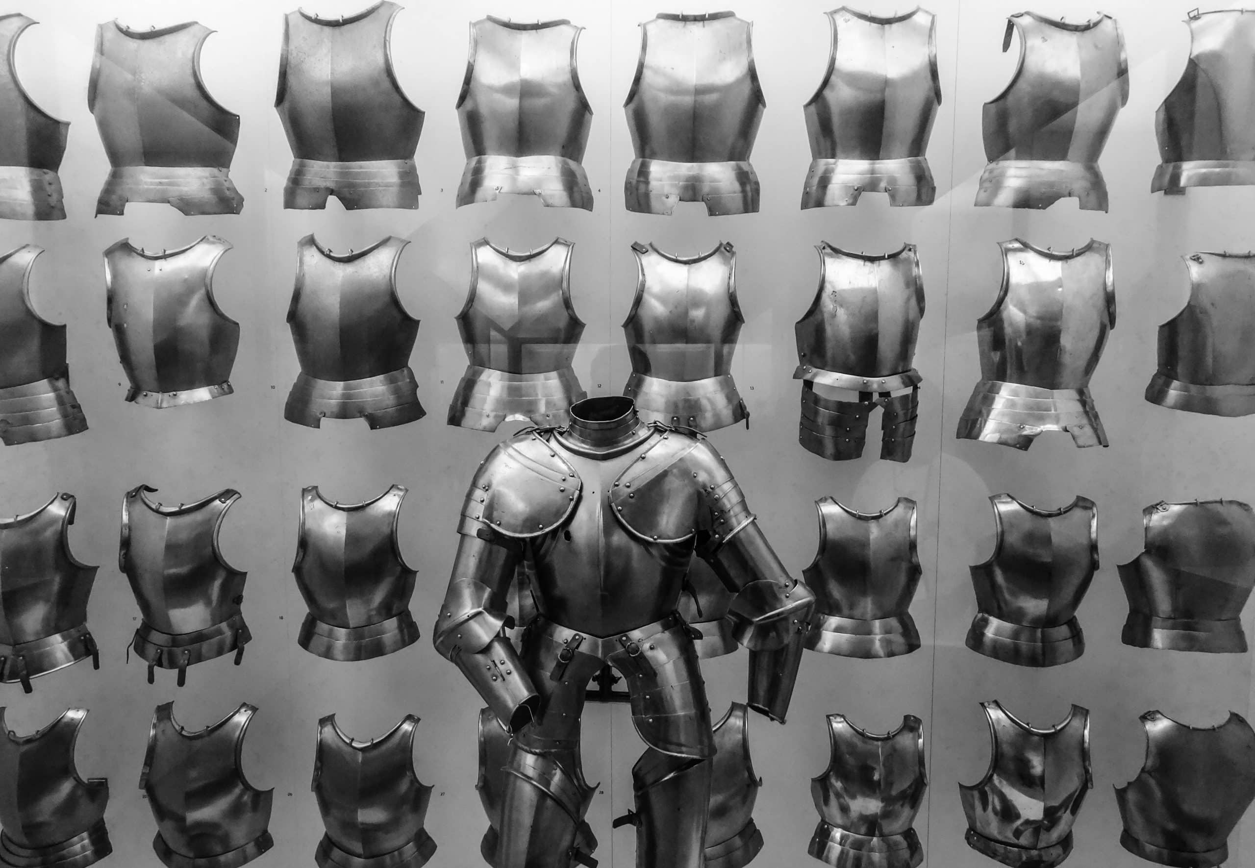 an image of different pieces of an armor suit and then the completed armor depicting how doing CRO marketing the right way turn your business right.