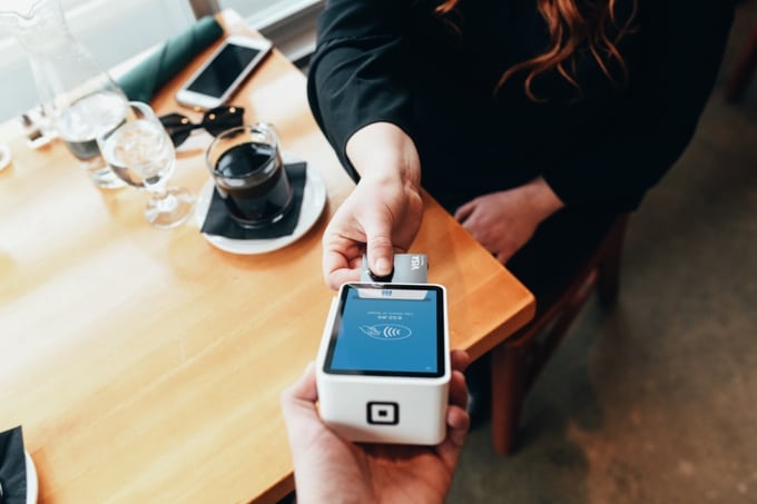 a conversion optimization making payments on a POS for an item they bought without discount
