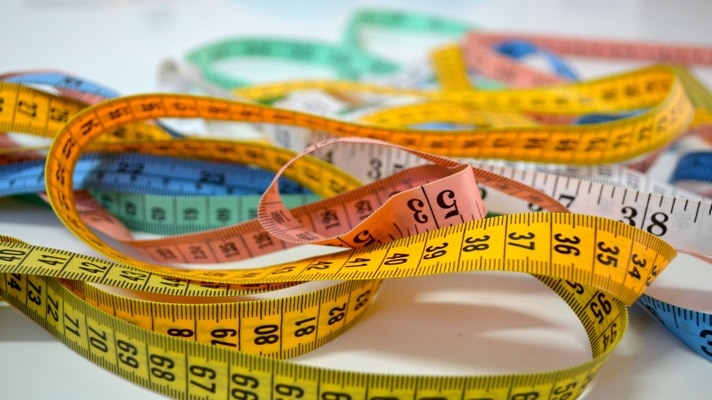 An image of a conversion optimization expert’s tape rule depicting measuring successful UX experience on a site