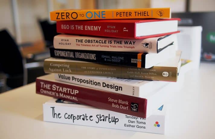 An image of different books with their amazing titles trying to sell us on their unique value proposition