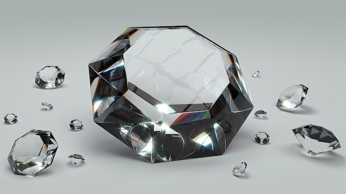 an image of differently sized cut diamonds that will be expensive based on their size signaling that CRO agencies are priced differently