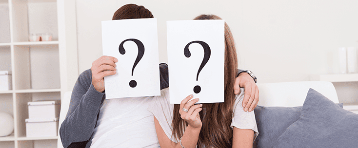 two users have placards with the question mark symbol written on them showing that the marketer has to find out their identities.