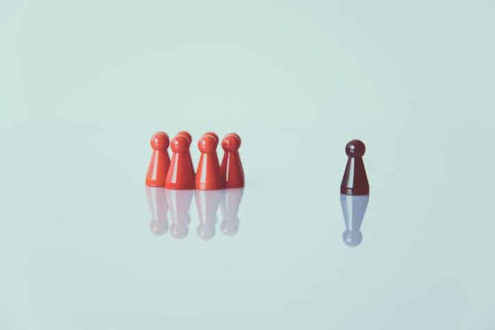 An image showing a chess piece standing out from other chess pieces in color and distance. How to build thought leadership