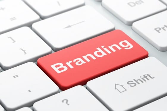 the image of a red colored button with the inscription branding. Depicting how branding influences purchase decisions