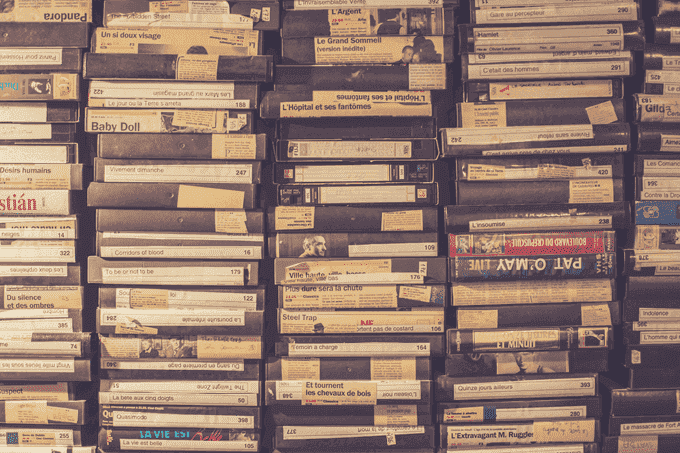 an image of video cassette tapes depicting recorded user sessions on a website that CRO expert will go through to mine customer behavior